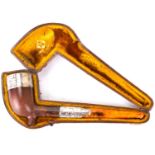 A vintage gentlemen's pipe with silver embellished border and collar and amber mouthpiece, length