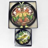 MOORCROFT; a 'Swan Orchid' pattern plate, by Emma Bosson, limited edition no.39/400, 2003, impressed