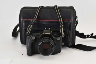 CANON; an EOS 650 camera, lens and bag.