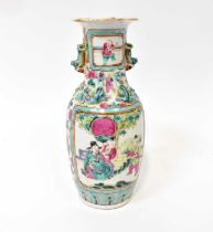 A late 19th century Chinese Famille Rose baluster vase with overall floral decoration, figural