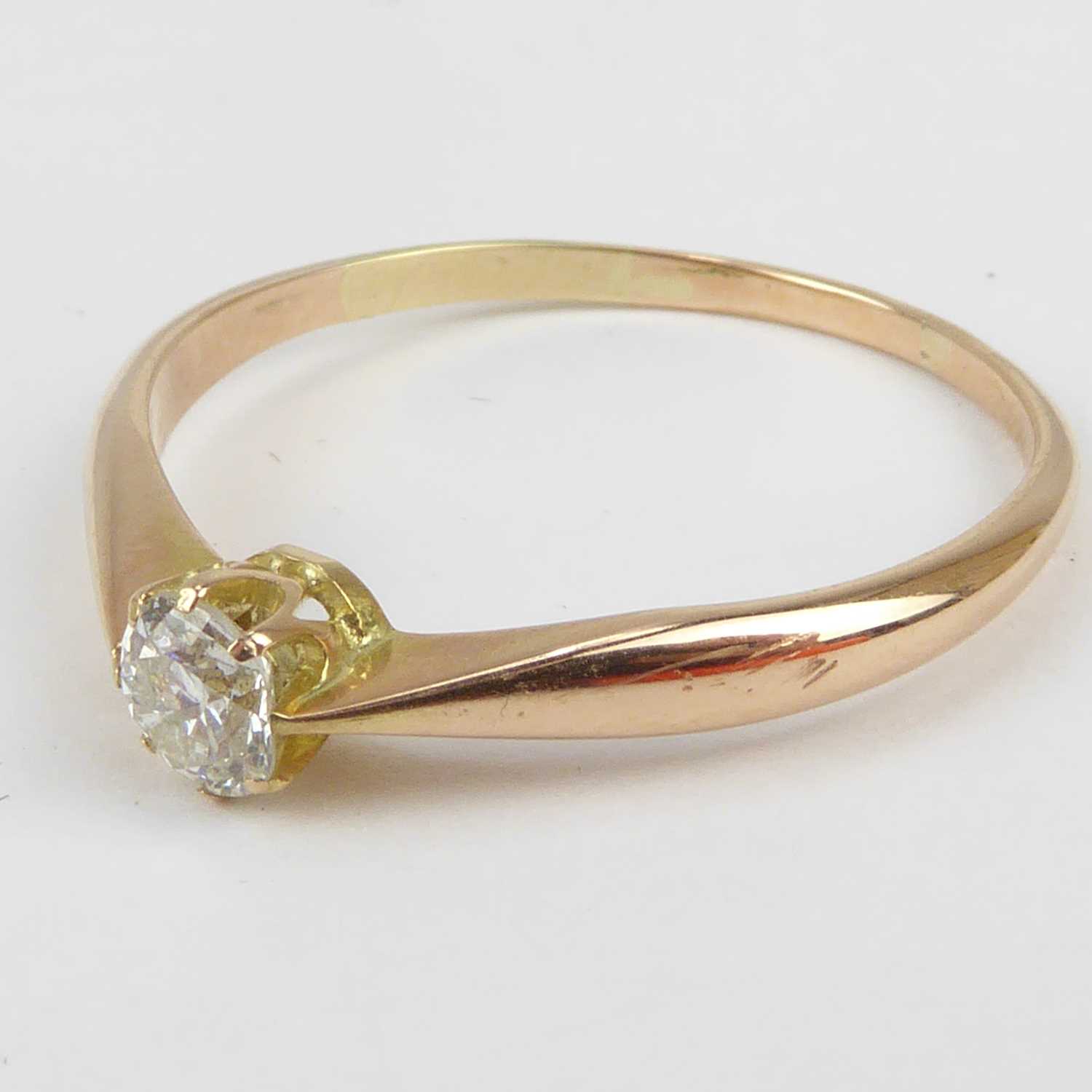 A 14ct gold claw set diamond solitaire ring, size V, approx. 2.3g. - Image 2 of 3