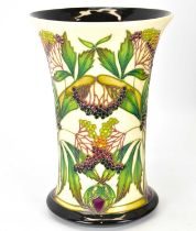 MOORCROFT; an 'Elderberry' pattern vase of flared form, designed by Philip Gibson, depicting