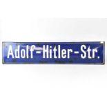 A blue enamelled street sign 'Adolf-Hitler-Str.', 20 x 90cm (af). Condition Report: - The street