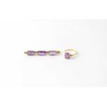 A 9ct gold ring set with oval amethyst in claw fittings, together with a 9ct bar brooch set with