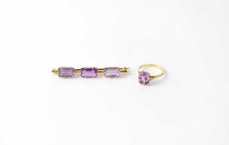 A 9ct gold ring set with oval amethyst in claw fittings, together with a 9ct bar brooch set with
