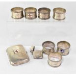 ELDER DEMPSTER SHIPPING LINE; commemorative items comprising silver seven napkin rings, each