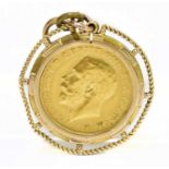 A George V full sovereign 1913, set in a 9ct mount, approx. 10.9g.