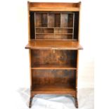 A 20th century oak students bureau over bookcase, with fitted interior, 118 x 56 x 30cm.