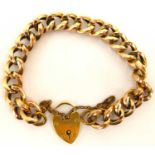 A 9ct gold bracelet united with a 9ct gold heart-shaped padlock clasp, length 17cm, approx. 12.6g.