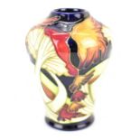 MOORCROFT; a 'Parasol Dance' pattern vase of small tapered form, by Kerry Goodwin, depicting wild