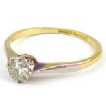 An 18ct white gold claw set solitaire diamond ring, approx. 0.3ct in white gold mount, to yellow