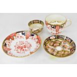 ROYAL CROWN DERBY; a 2712 pattern moustache cup and saucer, in the Imari palette, together with a