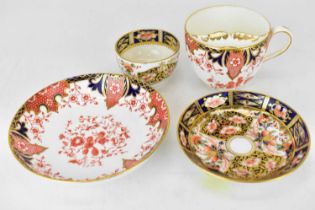 ROYAL CROWN DERBY; a 2712 pattern moustache cup and saucer, in the Imari palette, together with a