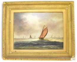 W. THOMAS; a 19th century oil on canvas seascape depicting sail barges and fishing boats on calm