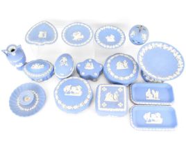 WEDGWOOD; eighteen pieces of jasperware, with applied white Classical decoration, to include