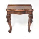 A contemporary mahogany serpentine-fronted single-drawer side table, raised on substantially