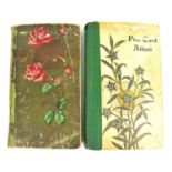 Two early 20th century postcard albums containing colour and black and white greetings cards,