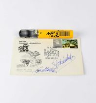 FIDEL CASTRO; a first day cover bearing the signatures of Fidel and Raul Castro, and a cigar in a