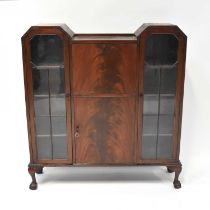 An early 20th century mahogany bureau bookcase, the central fall-front section fitted with simple