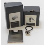 GEORG JENSEN; a boxed keyring designed by Klaus Rath, and a boxed stainless steel credit card holder