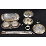 Four items of hallmarked silver, comprising a double coin holder, a single coin holder, installed '