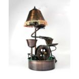 A contemporary copper indoor combination water wheel and lamp, overall height 70cm. Condition