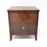 An Edwardian mahogany line inlaid side cabinet with a pair of panelled doors, above single drawer,