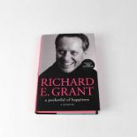 RICHARD E GRANT; a memoir, 'A Pocketful of Happiness', signed to interior. Condition Report: - We