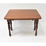 A Victorian walnut Pembroke table with single frieze drawer, raised on turned supports, 72 x 96 x