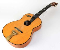 MARTIN COLETTI; a c.1950s Parlour six-string acoustic guitar, with applied name badge to the body,