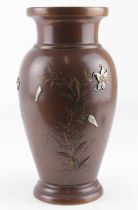 A Meiji period Japanese vase of ovoid form, decorated with floral designs with insects, guinea fowl,