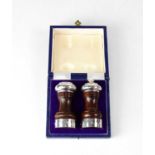 DA-MAR SILVERWARE; a cased set of Elizabeth II hallmarked silver mounted pepper grinder and matching