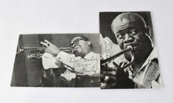 LOUIS ARMSTRONG; two black and white pages torn from magazine with the musicians signature to