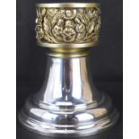 An Elizabeth II hallmarked silver candle lamp base, made by order of the Dean and Chapter of York to