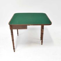 A Regency mahogany cross-banded and line inlaid D-end fold-over card table, raised on turned