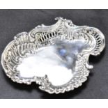 A Victorian hallmarked silver shaped dish with pierced shell and scroll sides, John Edward Wilmot,