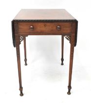 A 19th century mahogany Pembroke table with a single frieze drawer, pierced aprons and carved square