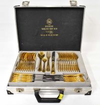 SOLINGEN; a sixty-eight piece gold plated cutlery set over two levels, in an aluminium-style carry