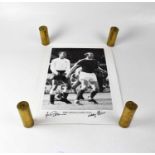 TOTTENHAM HOTSPUR; two black and white posters, one signed Jimmy Greave and Nobby Stiles, the