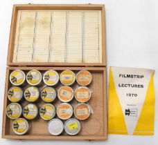 Eighteen film canisters from the Kodak Lecture Service, titled 'Film Strip Lectures 1970', all