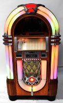 A 1950s-style CD phonograph jukebox by Santique Apparatus, model no. CD, with digital display and