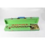 A Chinese flowers music harp stringed instrument, in a green painted case with transfer