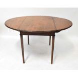 A George III mahogany drop-leaf supper table with D-ends, on square tapering legs, 71 x 124 x