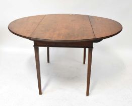 A George III mahogany drop-leaf supper table with D-ends, on square tapering legs, 71 x 124 x