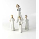 LLADRÓ; four figures of children in night dresses, height of largest 23.5cm (4). Condition Report:
