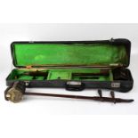 A cased Chinese erhu two-string fiddle and a further uncased example (2).