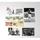 WORLD CUP 1966; three black and white photographs signed Bobby Moore, a first day cover signed by