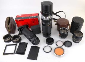 Various camera lenses to include a Tamron 1:3.8 1:4/210 80-210mm, CF Tele Macro, in case, a Mamiya