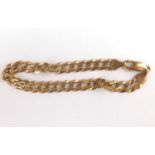 A 9ct gold flat curb bracelet with lobster claw clasp, length 21.5cm, approx. 13.8g.