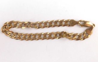 A 9ct gold flat curb bracelet with lobster claw clasp, length 21.5cm, approx. 13.8g.